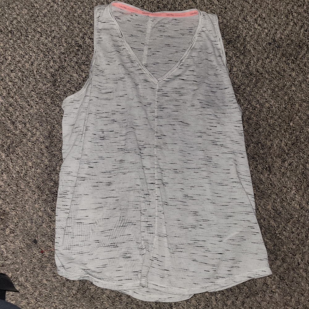 Calvin Klein white Tank top with slit and lower back size medium